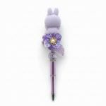 Pen met paarse bubu en bloem met licht